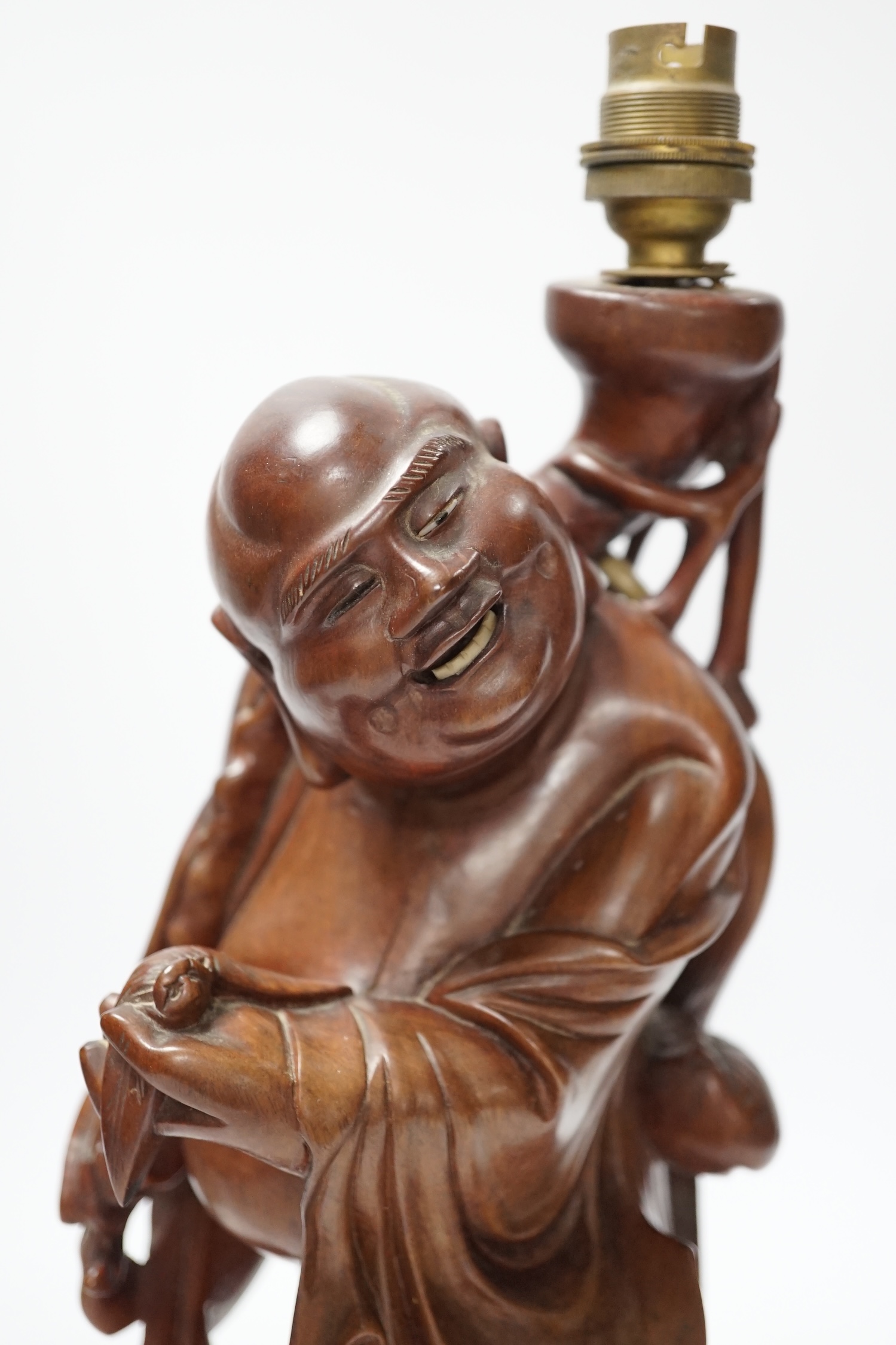 A Chinese carved hardwood figural table lamp base 42cm high